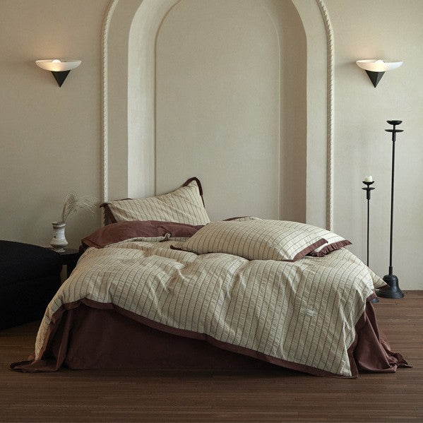Luxurious cotton bedding set with ruffled trim and pillowcases