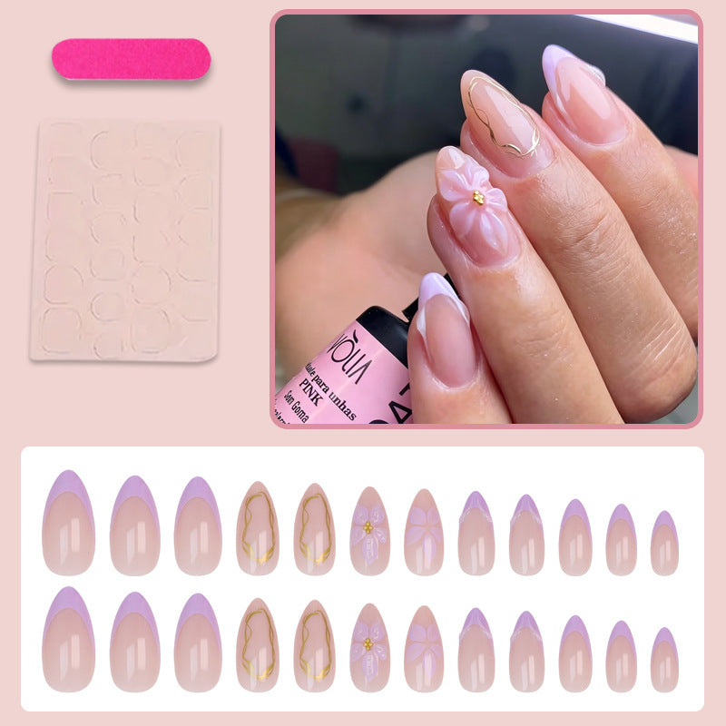 Artificial nail set with delicate floral decorations and elegant shine Stornfield