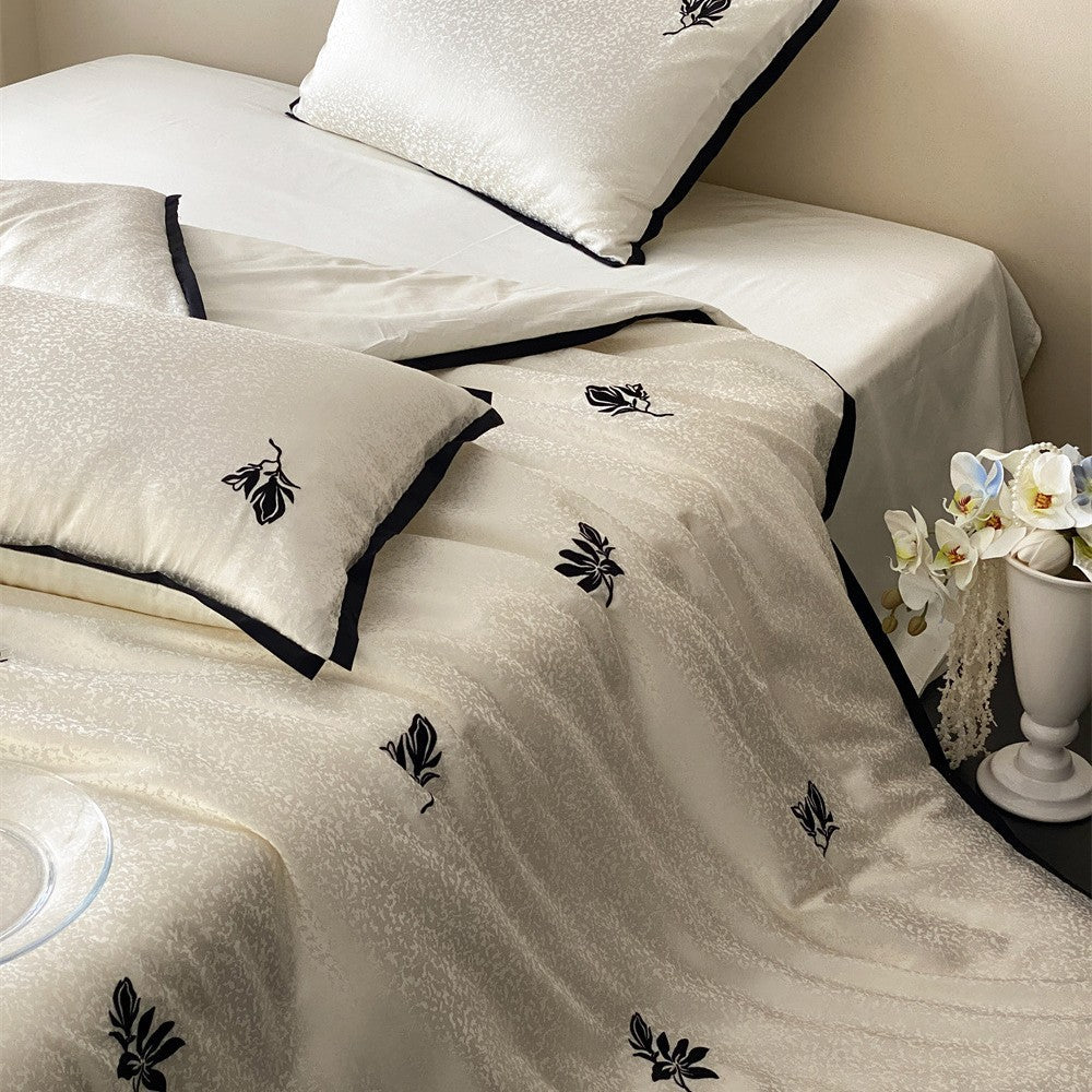 Reversible Jacquard Sateen Duvet Cover Set with Minimalist Botanical Embroidery and Contrast Piped Shams