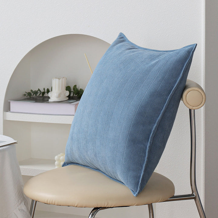 Decorative cushion with textured weave design