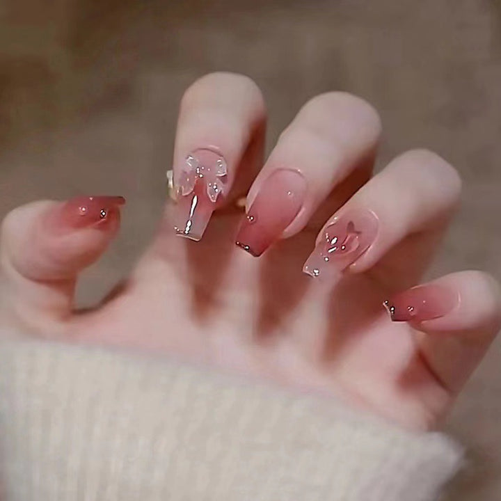Elegant Long Press-On Nails with Floral Accents Stornfield