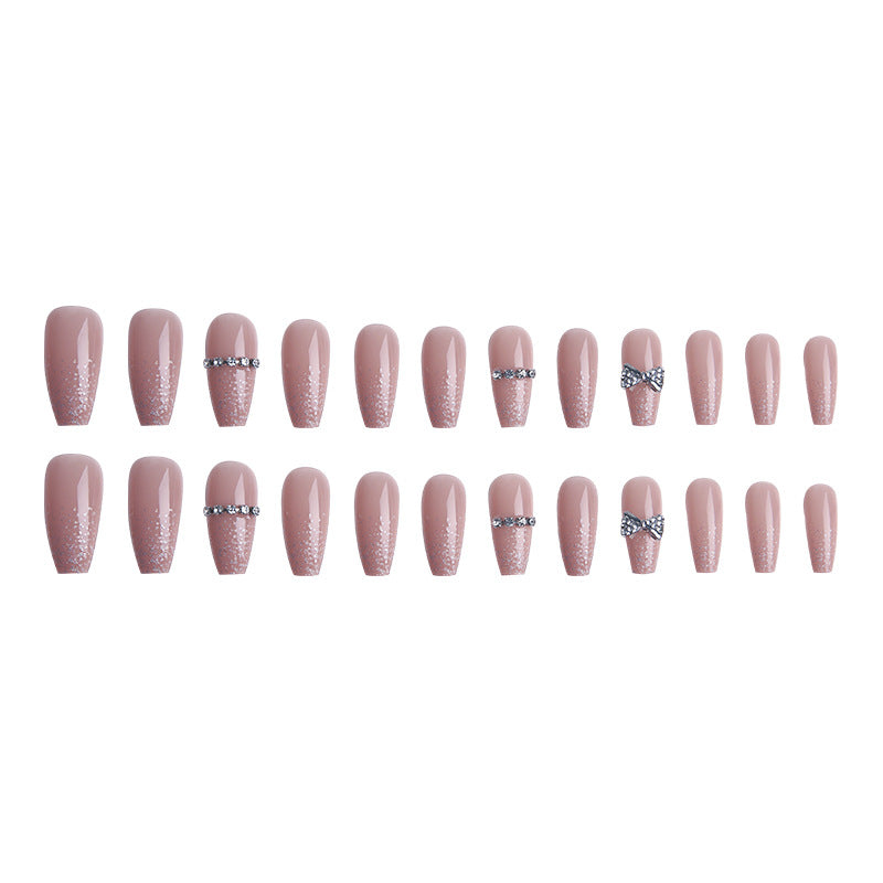 Glamorous artificial nails with sparkling rhinestone and glitter elements Stornfield