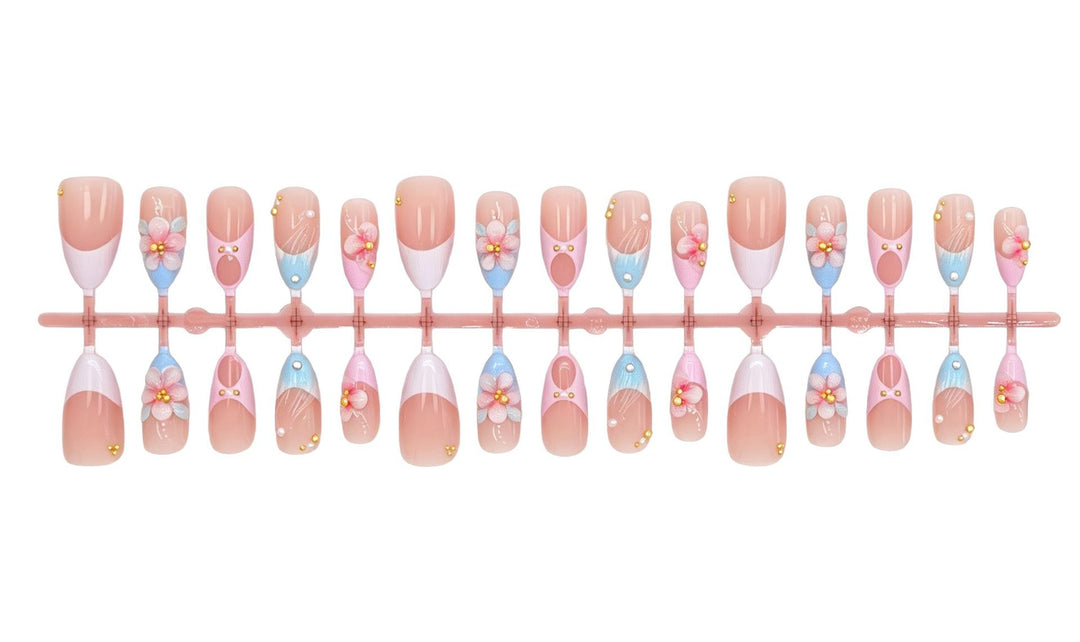 Artificial nail set with romantic floral motifs and elegant accents Stornfield