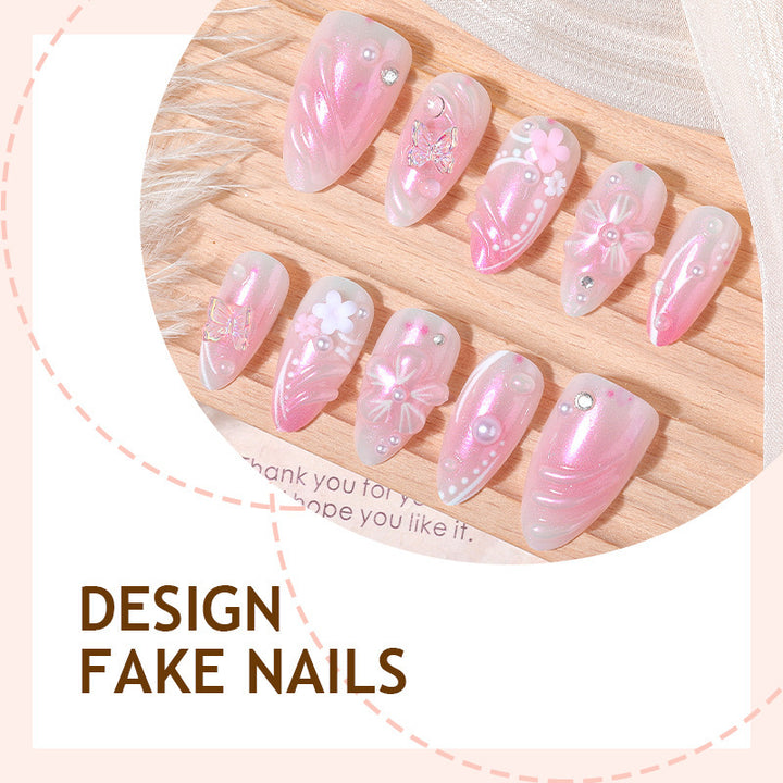 Acrylic nail set with elegant flower design and glitter accents Stornfield