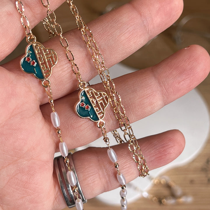 Artistic Gold-Plated Eyewear Chain with Decorative Cloud Charm Stornfield