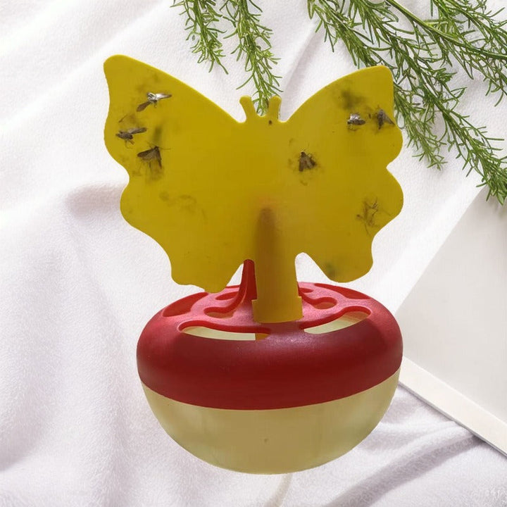 Butterfly-shaped sticky insect trap with refillable liquid reservoir and reusable base Stornfield