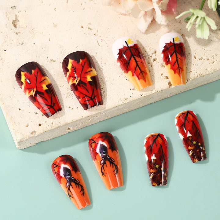 Artificial nails in autumn leaf design Stornfield