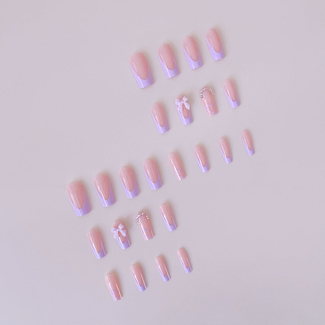 Artificial nail set with elegant 3D bows and glitter details Stornfield