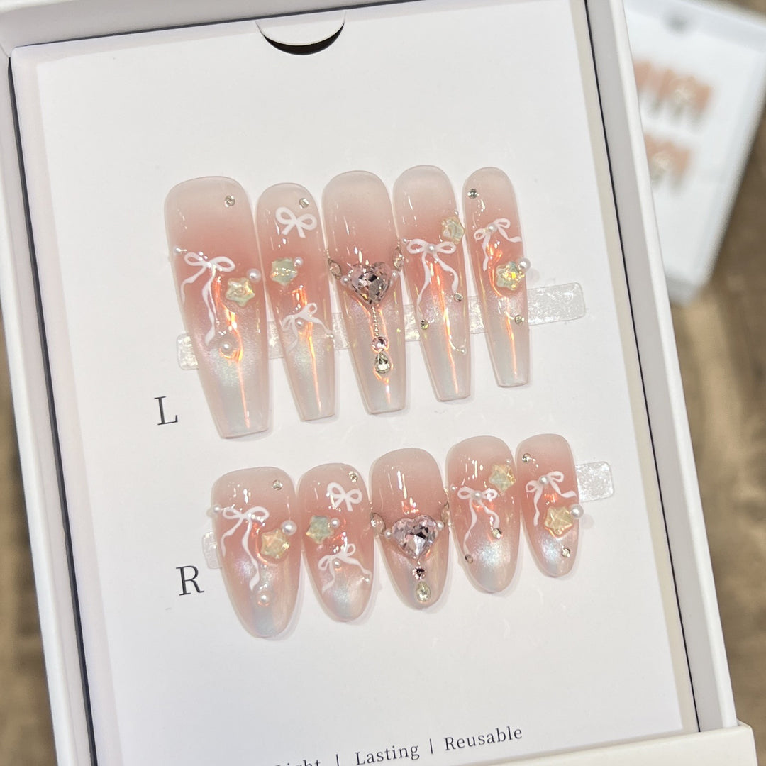 Elegant Press-On Nail Art Set with Chic Ribbon and Gem Accents Stornfield