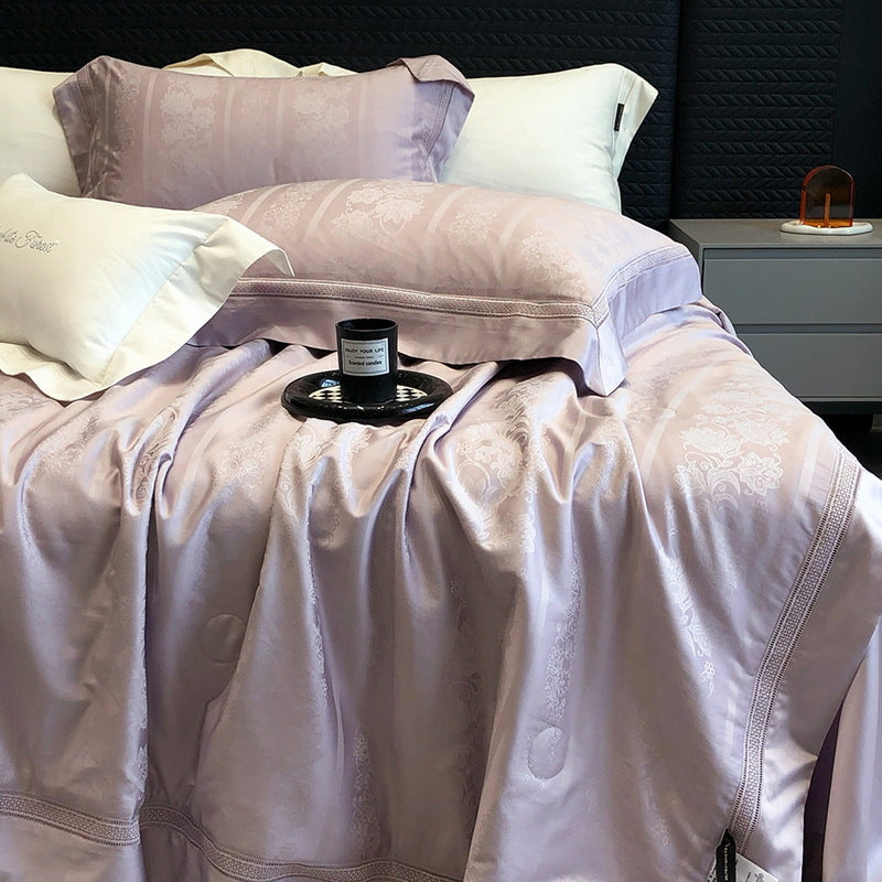 Premium bedding set made of cotton satin with subtle circle stitching and hotel closure