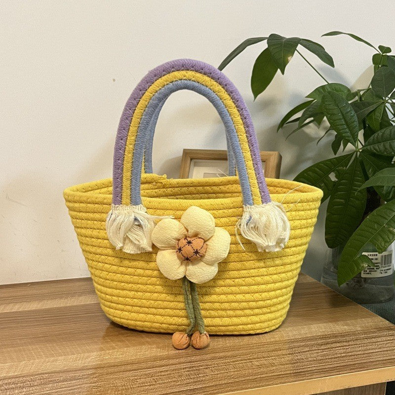Women's handmade basket bag with color-coordinated handle accents Stornfield