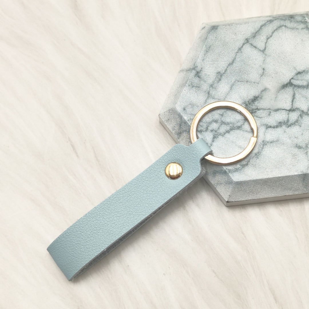 Unisex keychain made of high-quality synthetic leather with elegant metal embellishment Kalsten