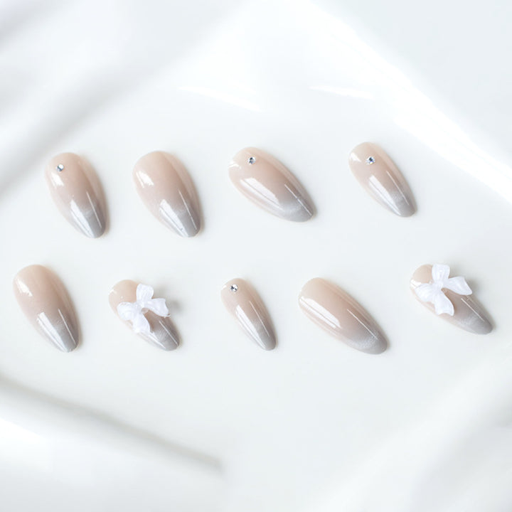 Elegant Rhinestone and Bow Nail Art Extensions Stornfield