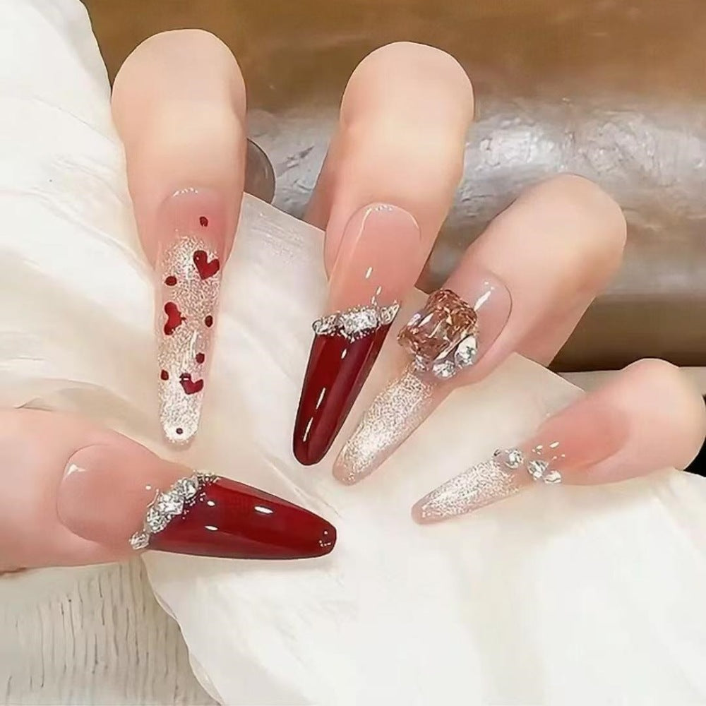 Glamorous Stiletto Nail Art Extensions with Heart Accents