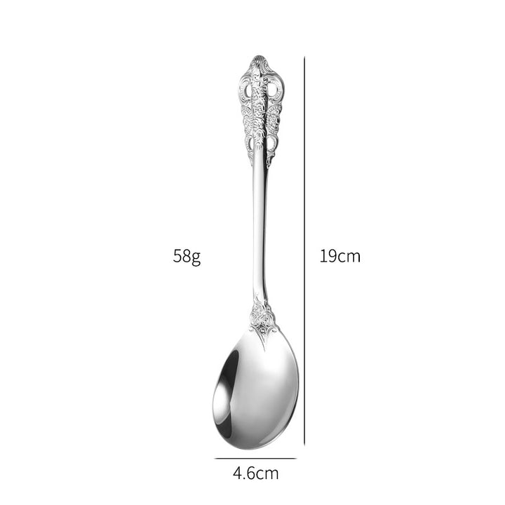 Elegant fish fork with artistic handle design Stornfield