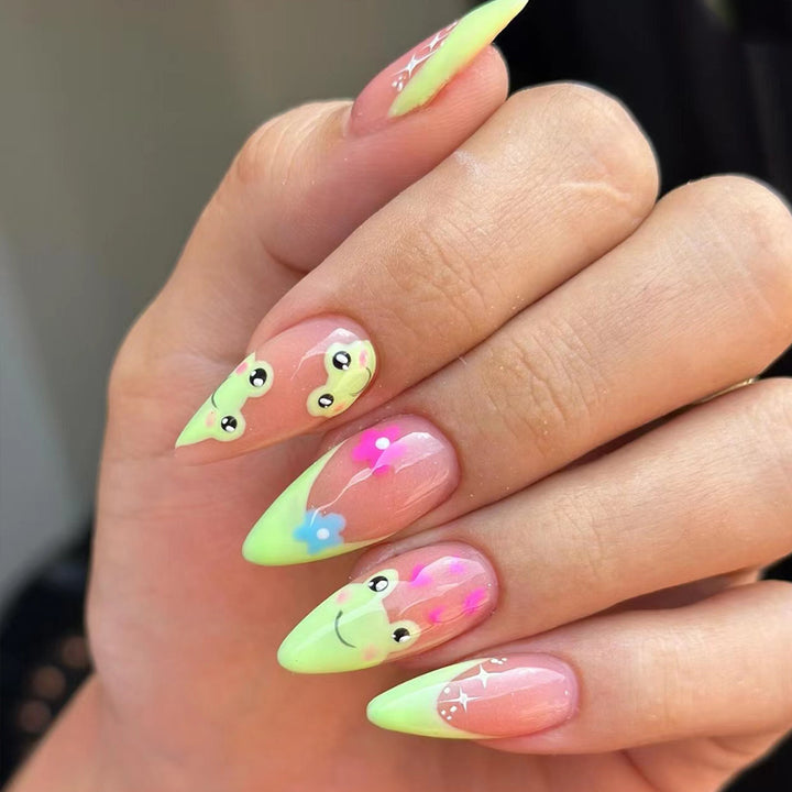 Artificial nail set with creative frog designs and playful accents Stornfield