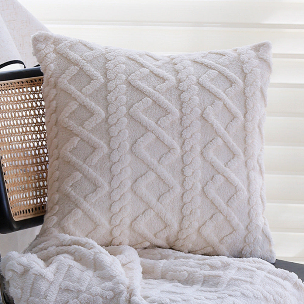 Cuddle blanket with textured surface