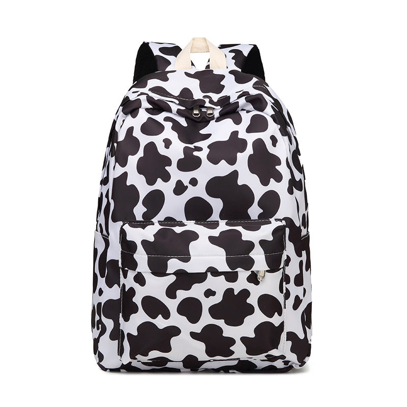 Stylish Cow Print Backpack and Accessory Set Stornfield
