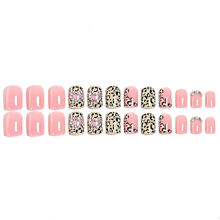 Glamorous artificial nail collection with animal motif and crystal embellishments Stornfield