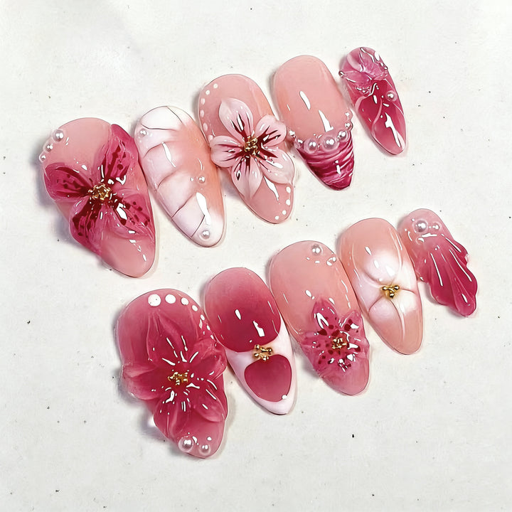 Elegant artificial nails with floral designs Stornfield