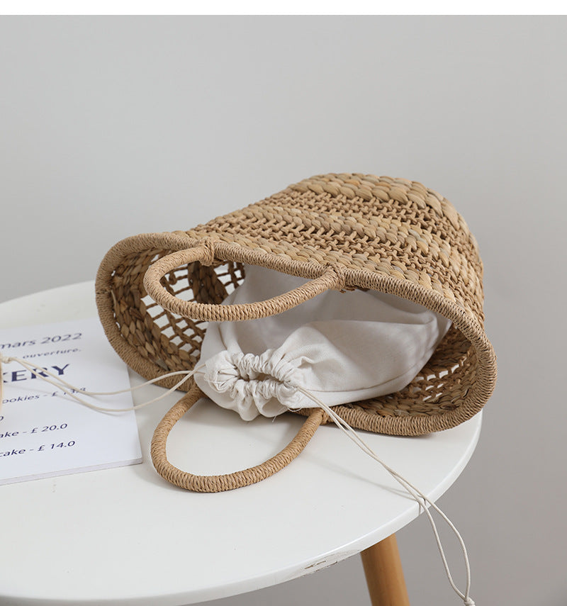 Handmade rattan bag with a removable lining insert Stornfield