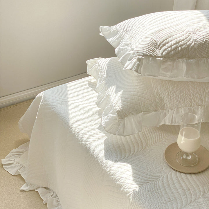 Quilted bedspread set with ruffle and embossed leaf quilting