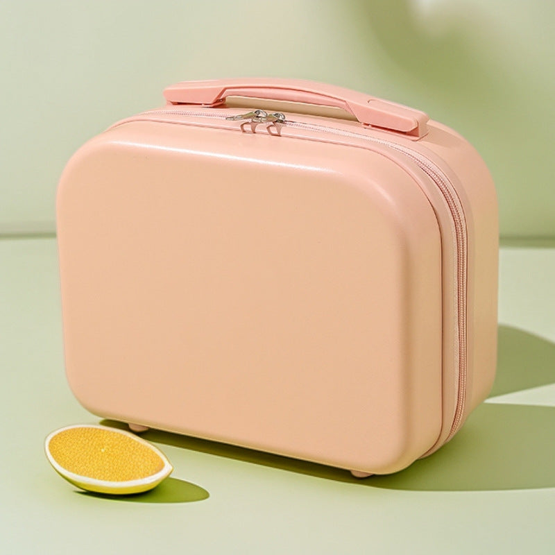 hard-shell travel vanity case with molded handle and double-zip closure Stornfield
