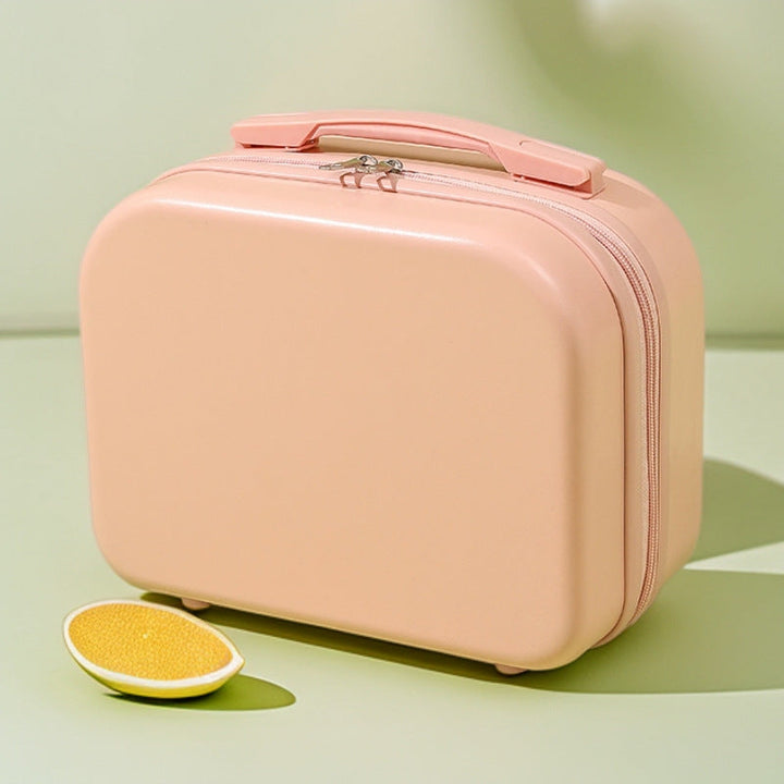 hard-shell travel vanity case with molded handle and double-zip closure Stornfield