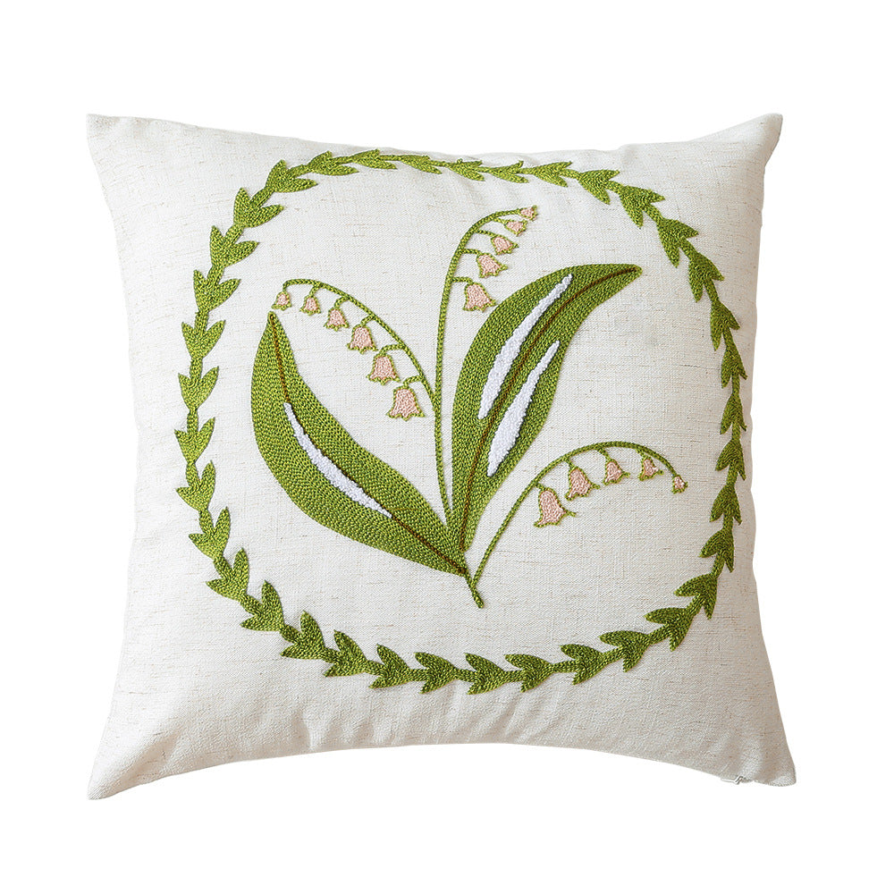 Square bouclé decorative cushion with tufted flower appliqué