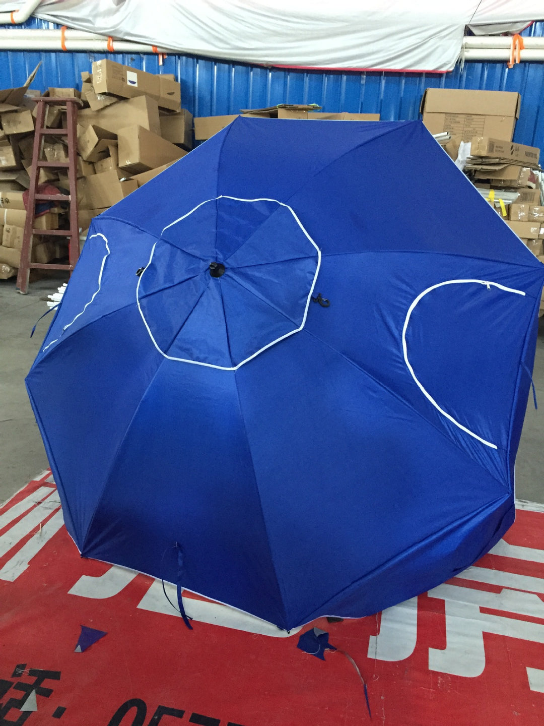 Sturdy beach umbrella with UV protection Stornfield
