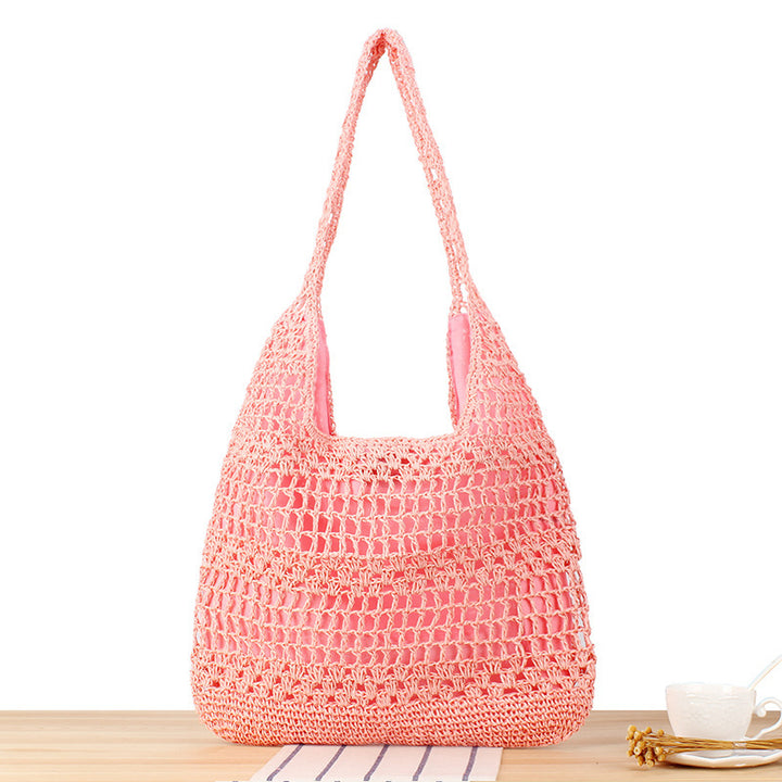 Handbag with floral appliqué Made of natural material Stornfield