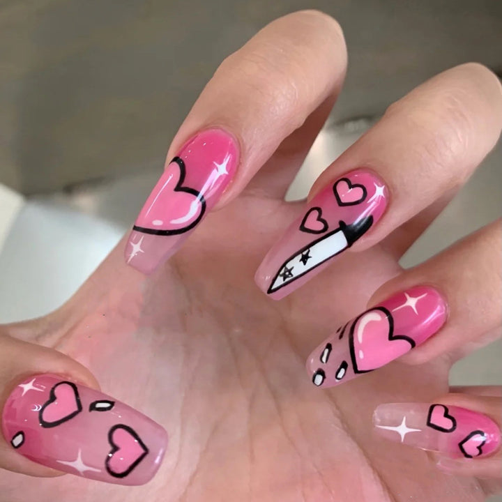 Artful stiletto nails with romantic heart design Stornfield