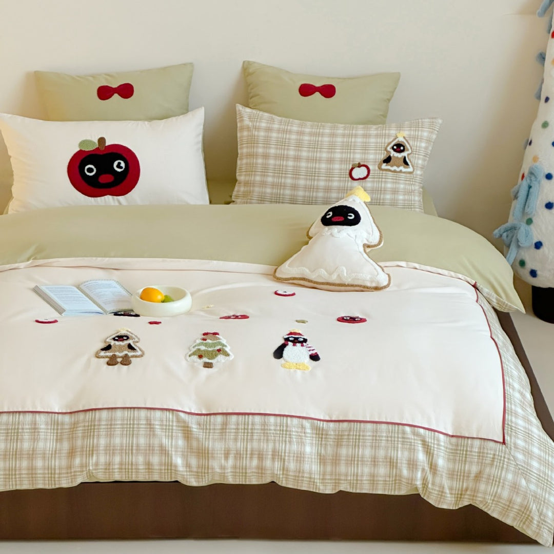 Children's bedding set with appliquéd winter figures and checkered ruffle