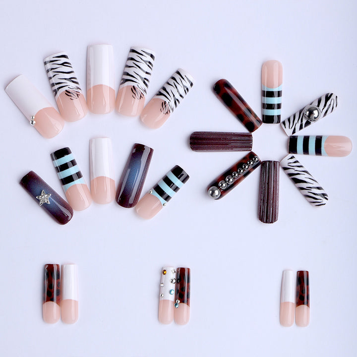 Artificial nails in modern striped design with 3D decoration Stornfield