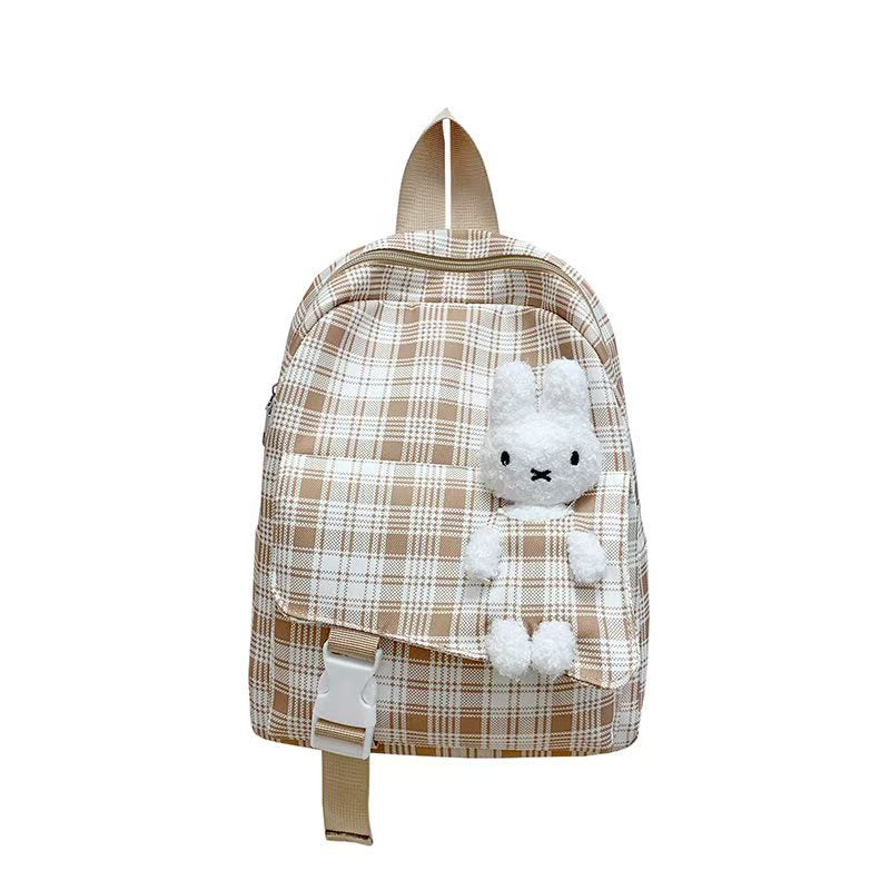 Backpack with Playful Checkered Pattern and Cute Plush Pendant Stornfield
