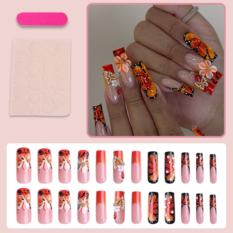 Artificial nail set with elegant floral and glamorous decorations Stornfield