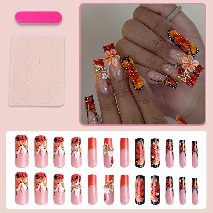 Artificial nail set with elegant floral and glamorous decorations Stornfield