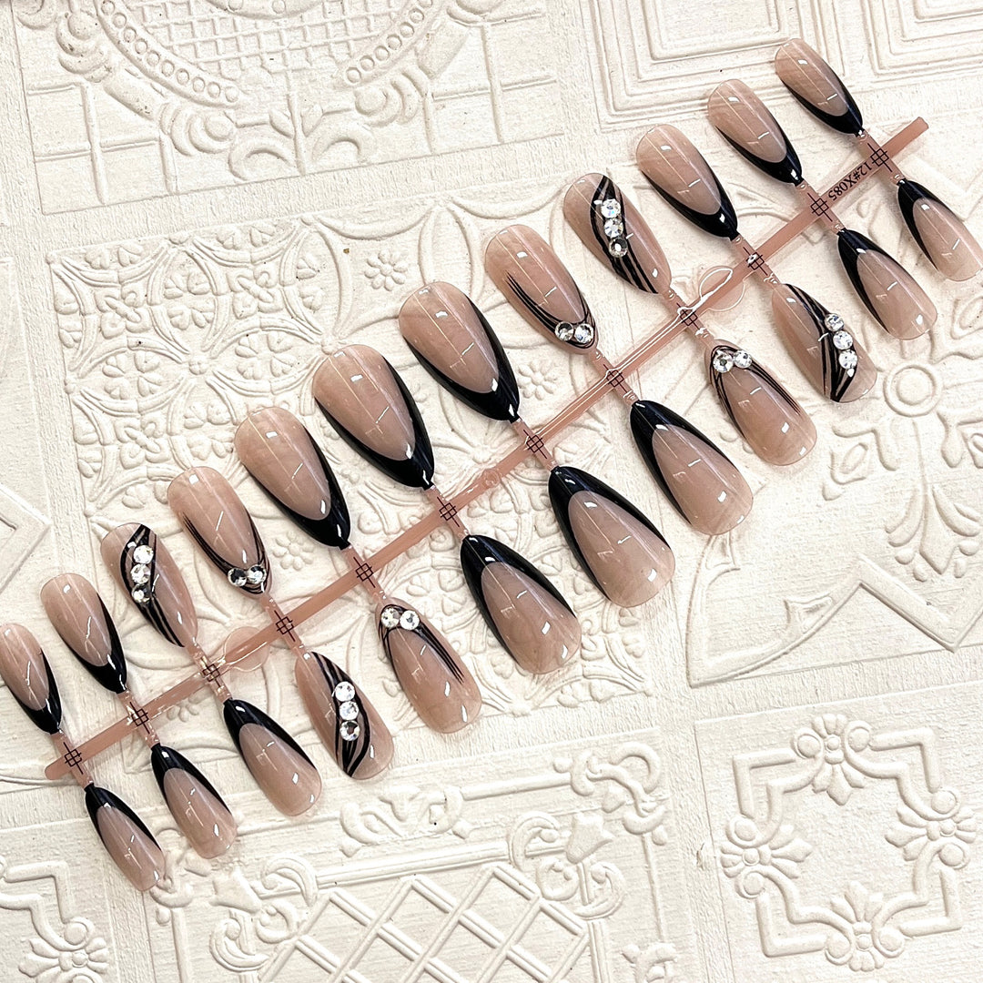Elegant Press-On Nail Design with Rhinestone Accents Stornfield