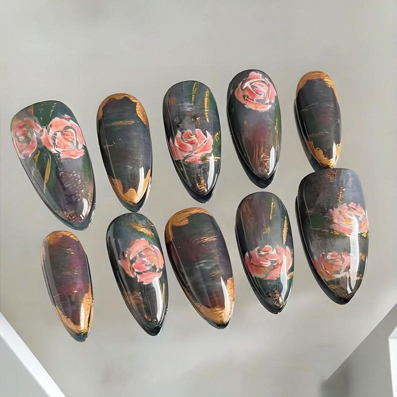 Artificial nails with romantic rose motifs and elegant gold rim Stornfield