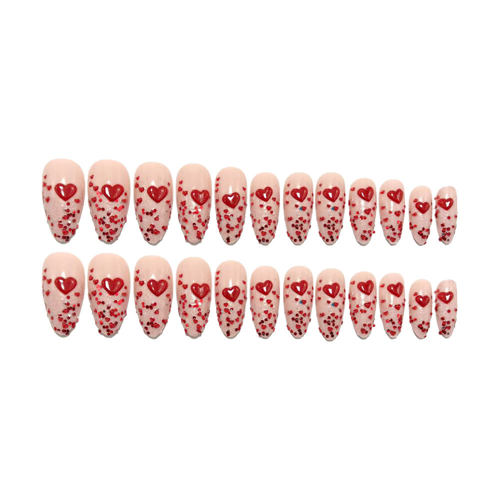 Artificial nails with sparkling heart design and glitter coating Stornfield