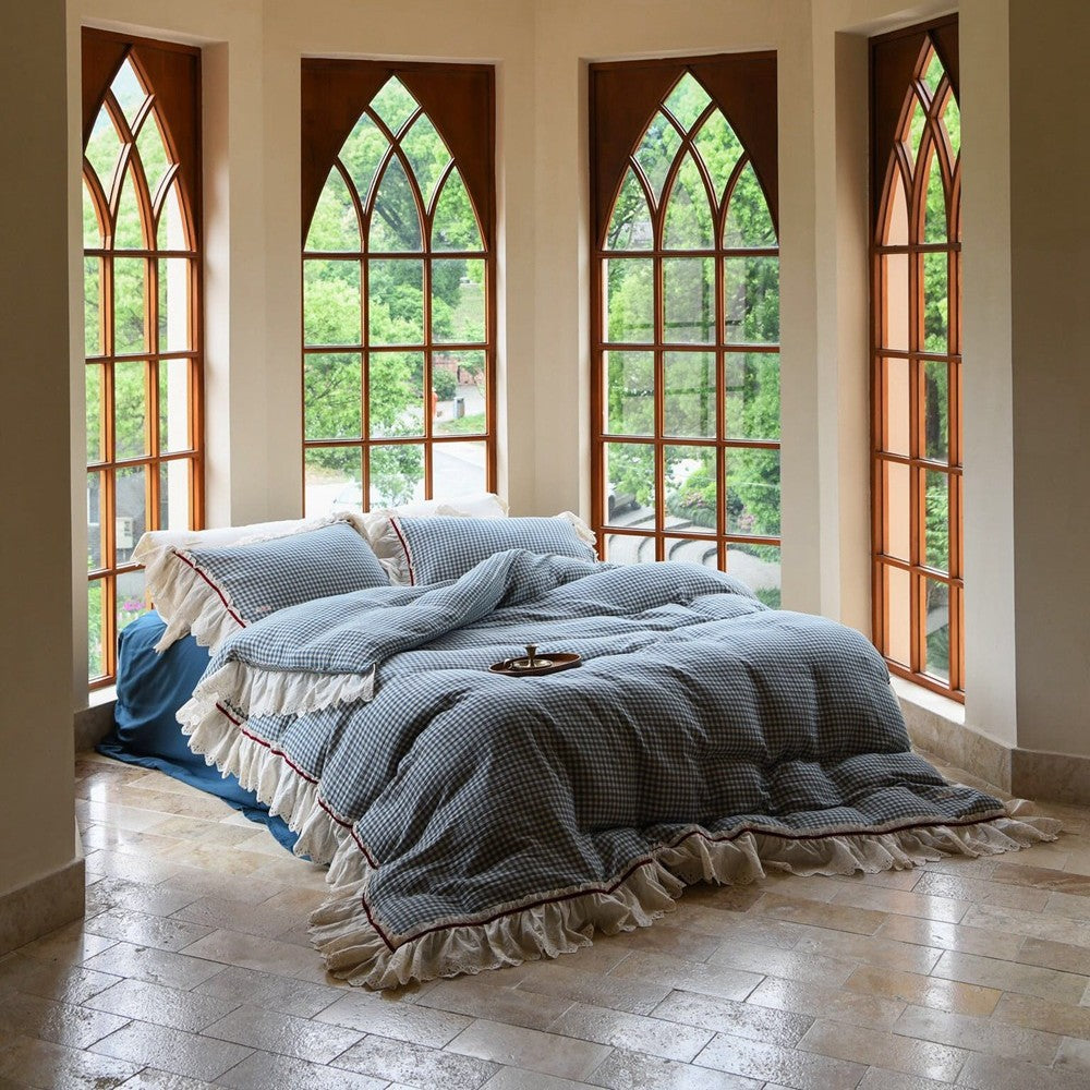 Luxurious bed linen set made of cotton gauze with quilted blanket and lace trim