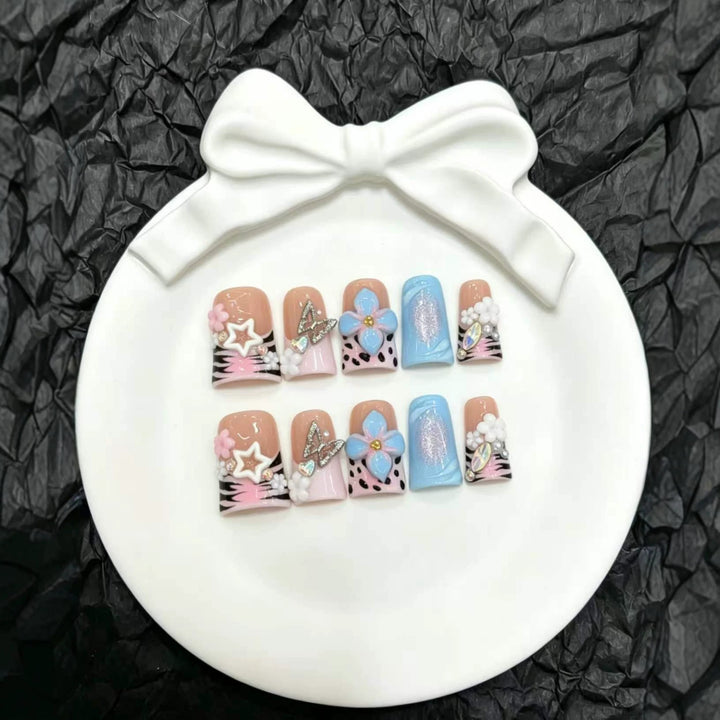 Artistic Nail Art Press-On Set with Floral and Gem Accents