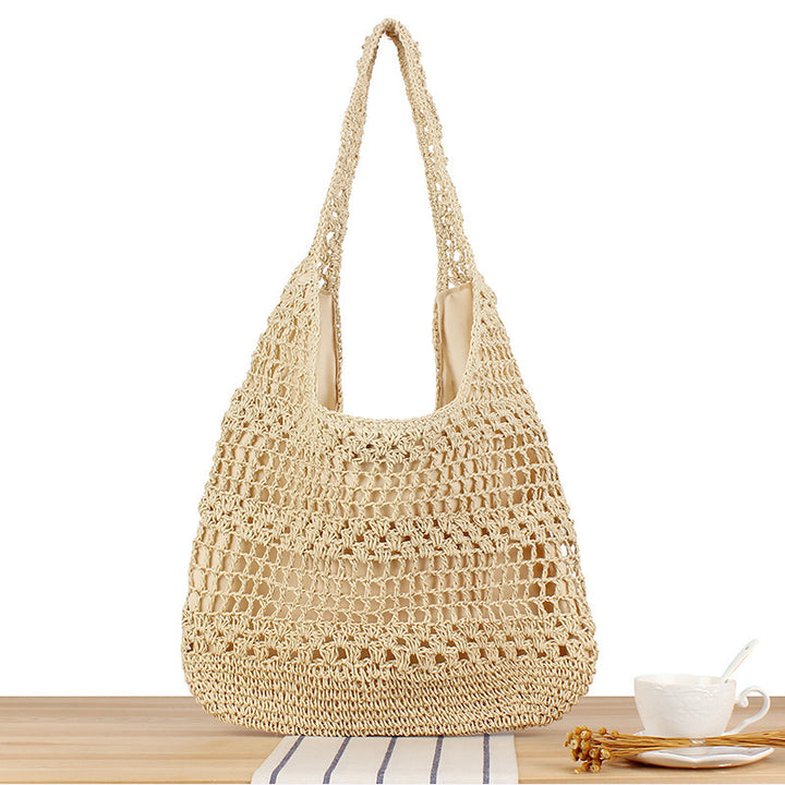 Handbag with floral appliqué Made of natural material Stornfield