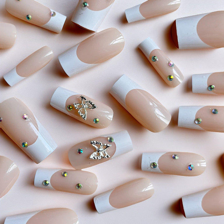 Elegant Stiletto Nail Extensions with Rhinestone Accents Stornfield