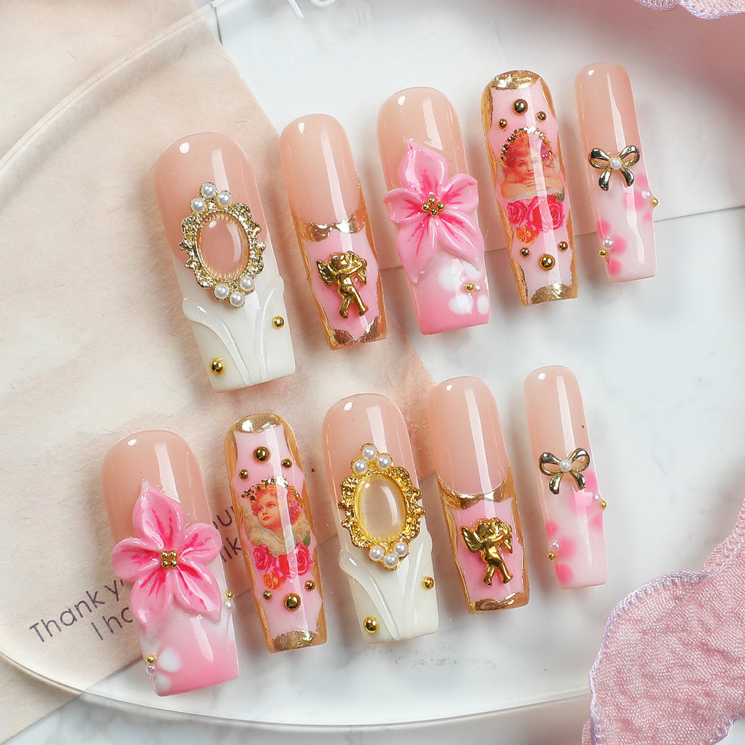 Creative nail art set with blooming decorations and glitter accents Stornfield