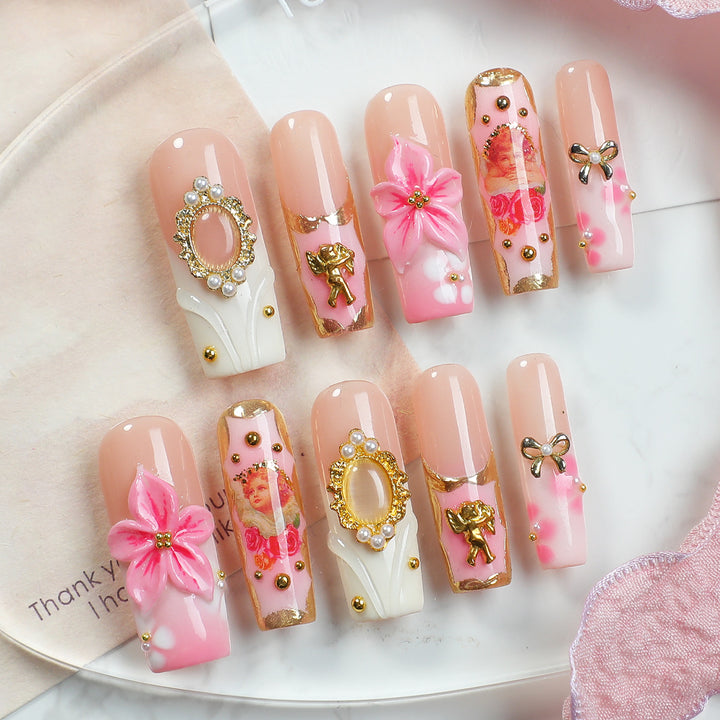 Creative nail art set with blooming decorations and glitter accents Stornfield