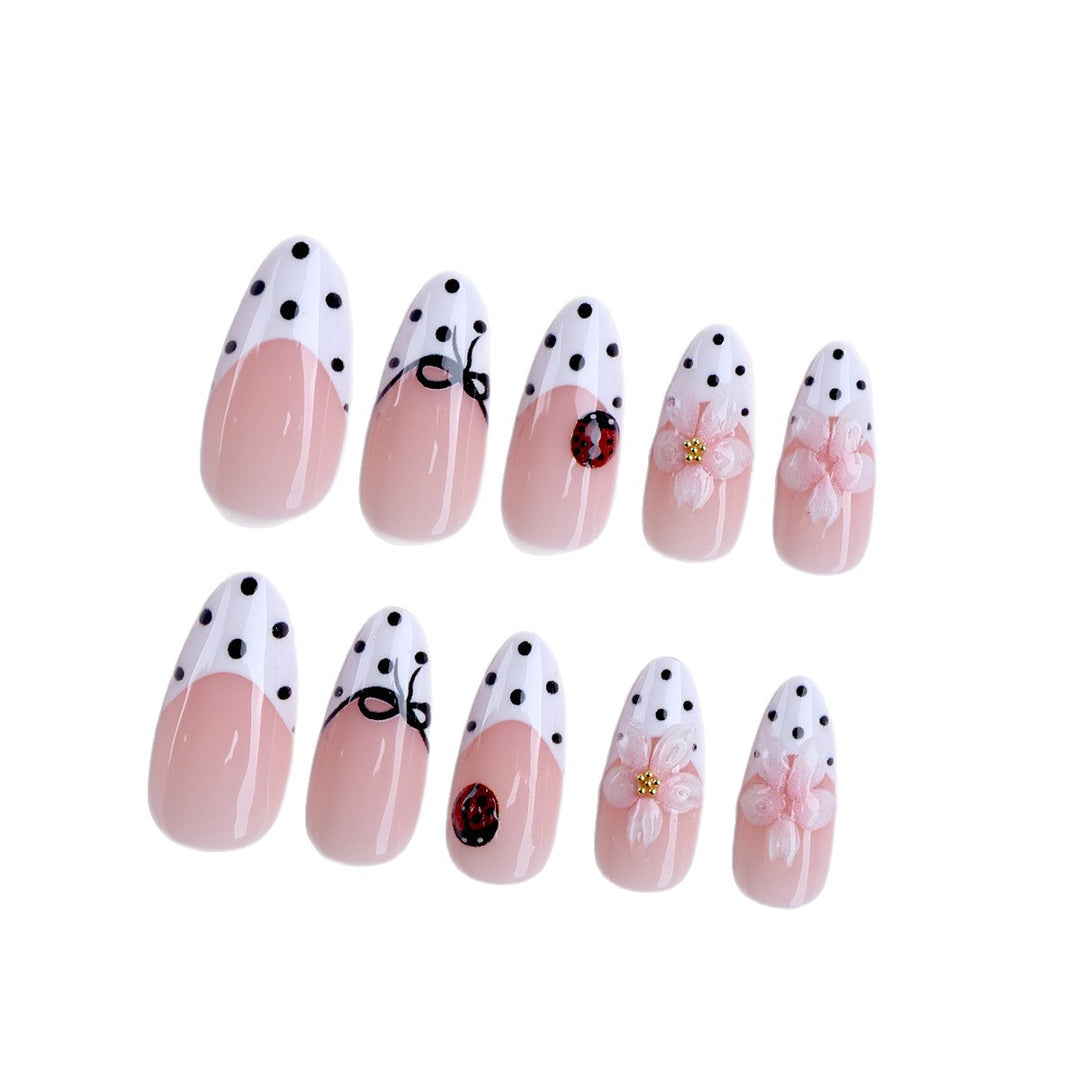 Artificial nail art with floral and playful accents Stornfield