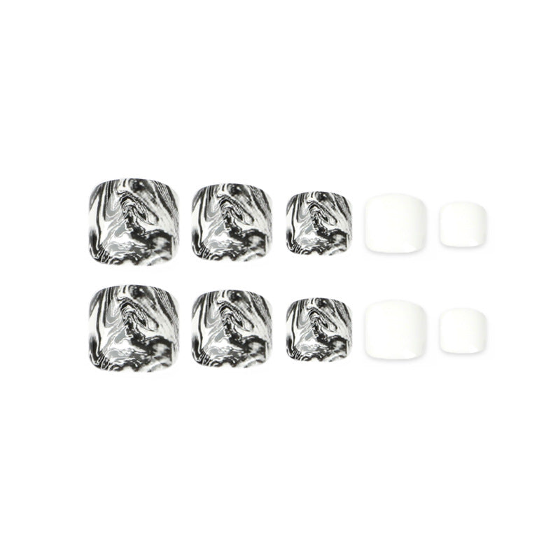 Artful toenail art in elegant marble design Stornfield