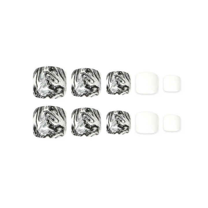 Artful toenail art in elegant marble design Stornfield