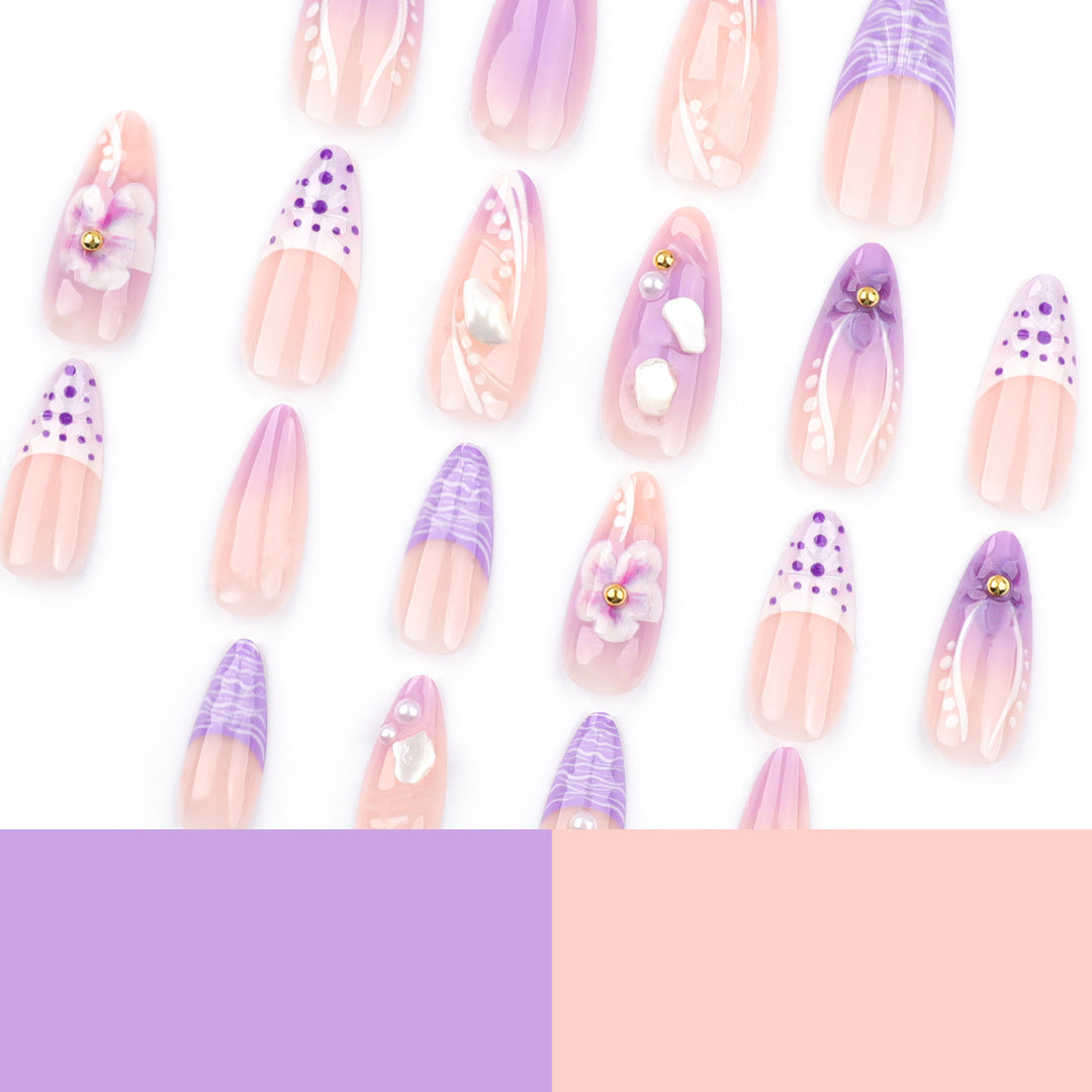 Artful nail extensions with elegant floral embellishments Stornfield